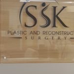 SSK Sign at his office